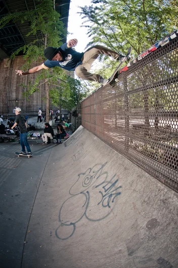 <!--danyc14-->

Dan Corrigan was one of the few who wasn't afraid to make it to the top of this crazy fence wallride.  Rock and Roll.