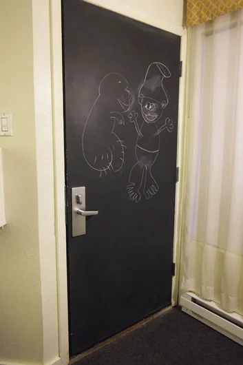 At our hotel, the doors are chalkboards.  Of course, I have to go straight to drawing dicks. Papa Smurf is pretty random.<!-- Portland 2013 for Some Nike Bid'niss -->