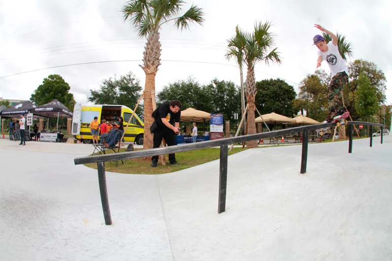 <!--brobowl2-->

Wesley Box holding on to that boardslide across and down. Photographer's nightmare, camo pants.