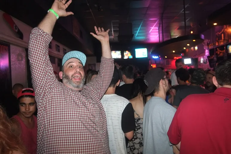 Nick Halkias has the rollercoaster stance for his party photo.  That's a good one to change it up to from the standard thumbs up, sideways peace sign, shocker, etc.<!-- Tampa Pro 2013 Party Featuring Big Boi -->