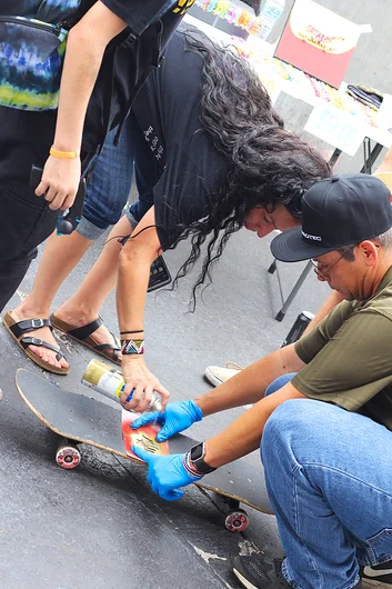 <!--b4bbuildday17-->

Bruno Robles and Vivan Fisk were some volunteers here helping kids add some flavor to their grip with some stencils and a few shots of spray paint.