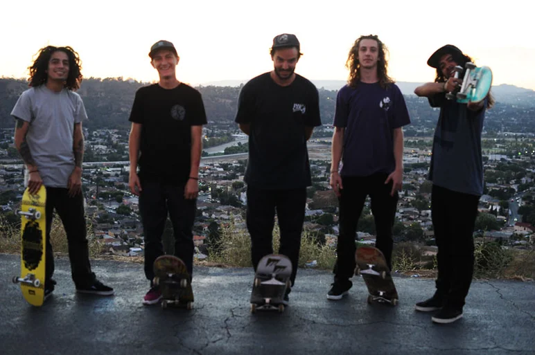 Boy band photo, take two. Always make sure you have your skateboard as an accessory to ensure album sales performance.<!-- One Day in East LA -->