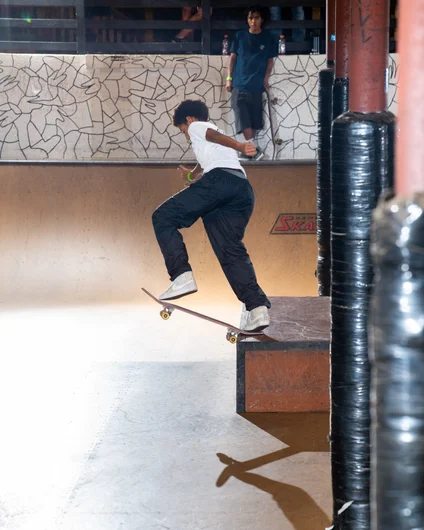 Jordan Clark moves over to the hubbas for a back tail.

<!--backtoschoolbash2022-->