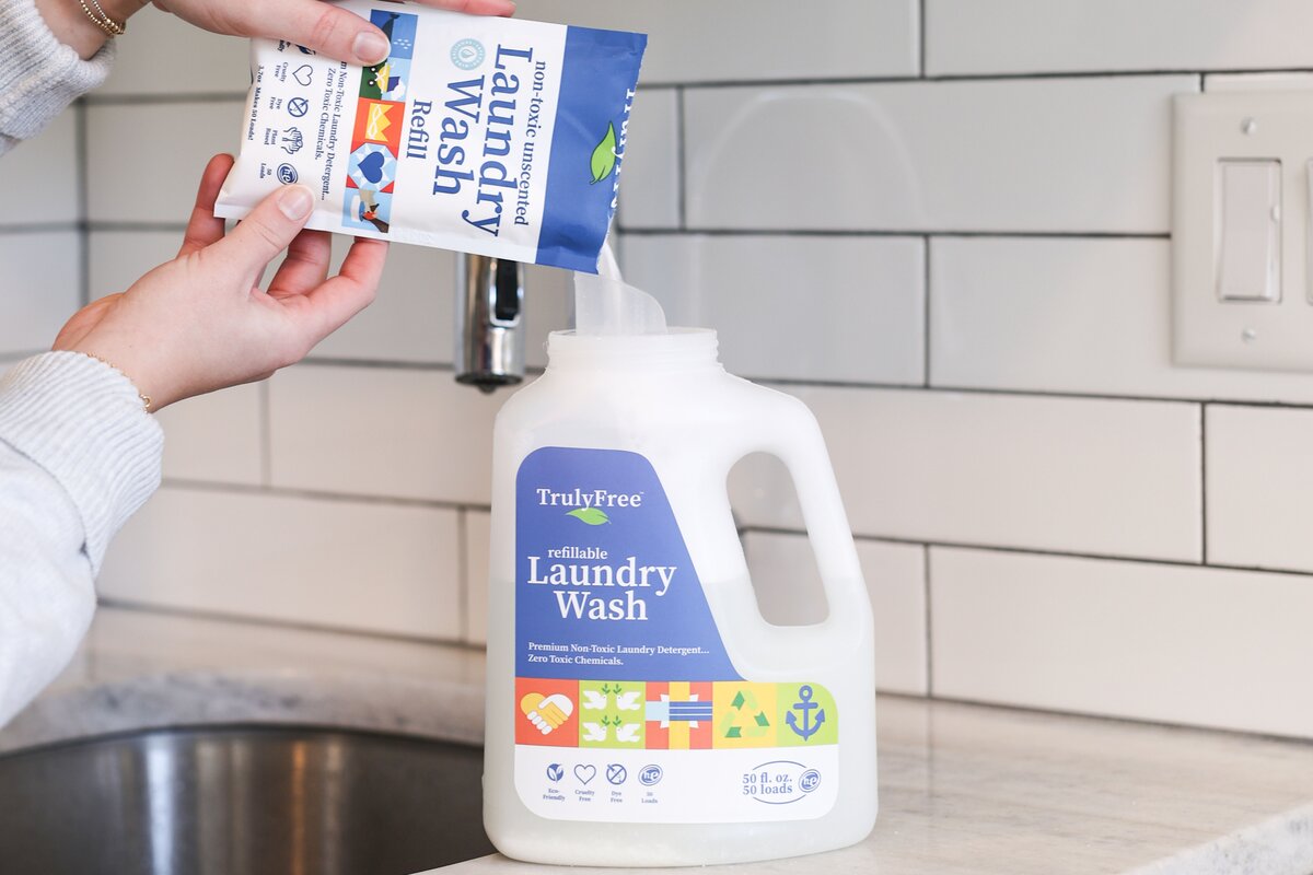 TFH Laundry Wash refill being poured into jug