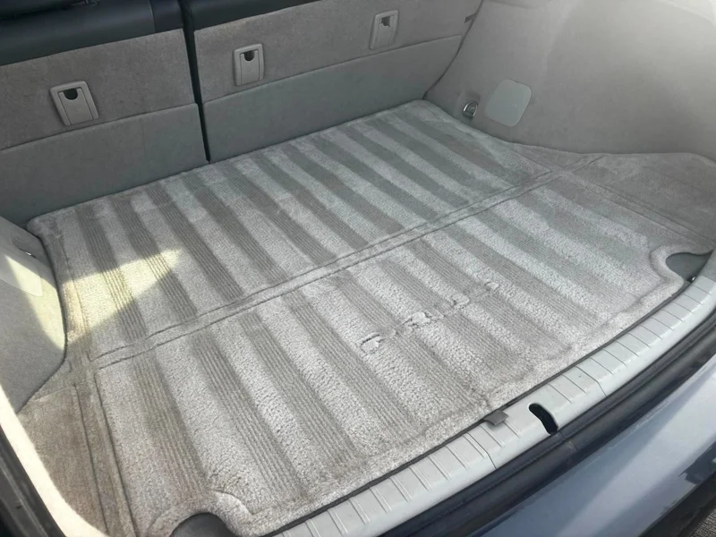 Clean cargo floor and rear carpet after an interior detail