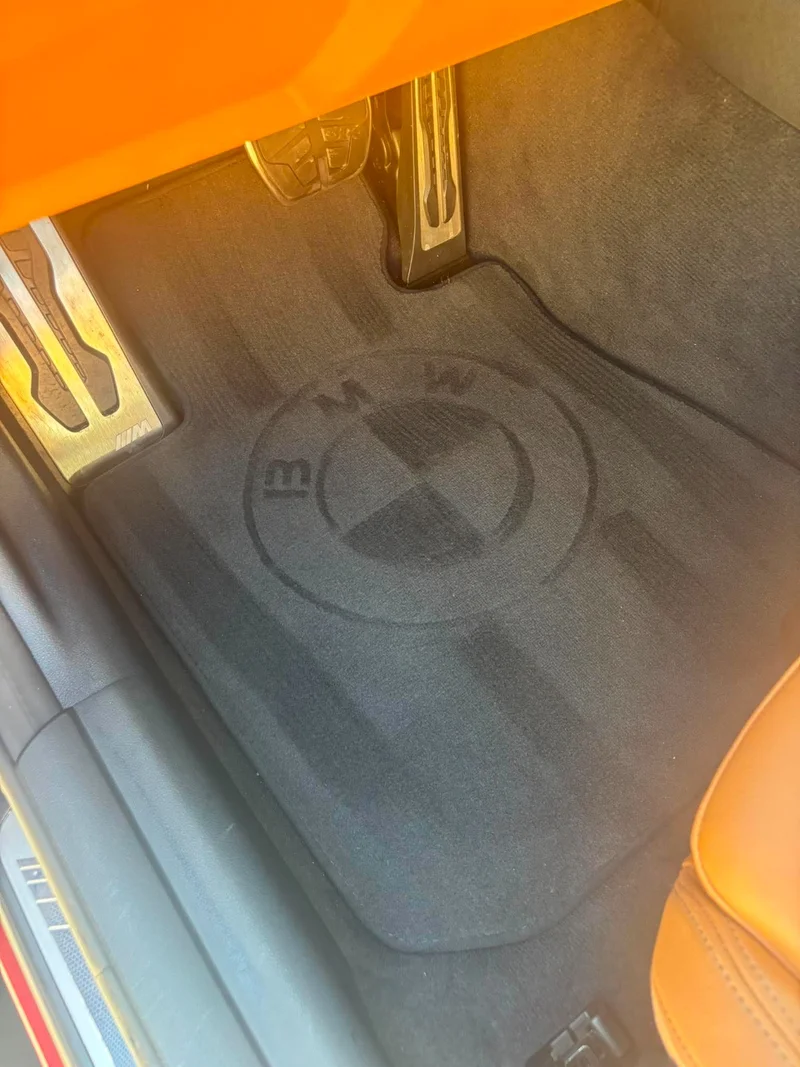 Clean luxury SUV rear cargo area after interior detailing