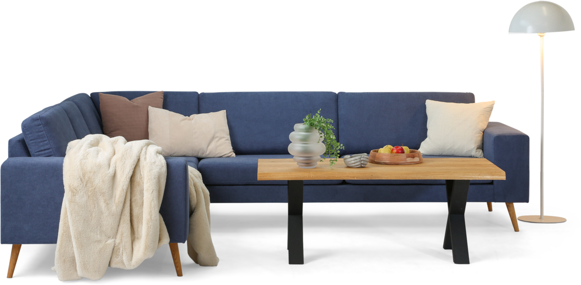 Blå Sienna hjørnesofa med sofabord, gulvlampe og dekoration