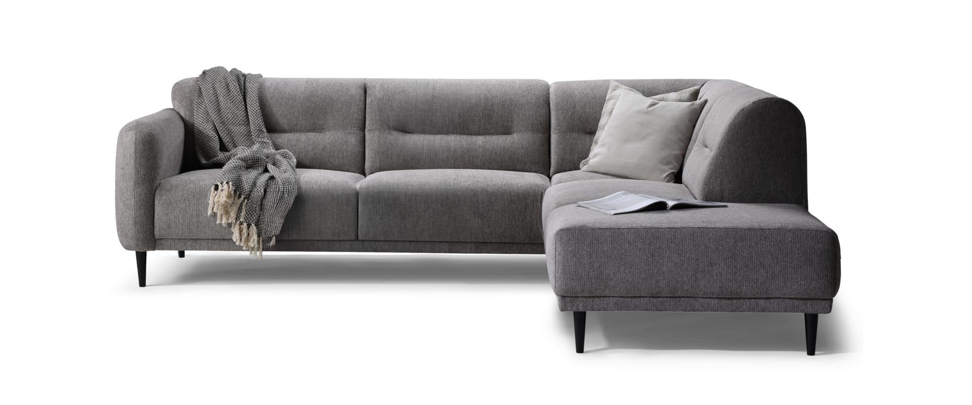 Halifax sofa med open end i gråt møbelstof pyntet med puder og plaid