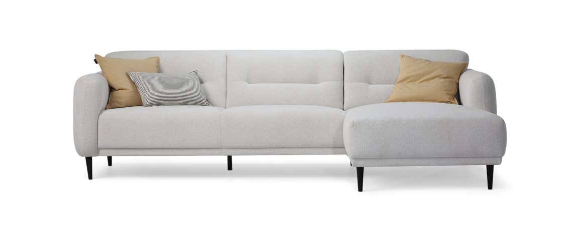 Hvid Halifax sofa med chaiselong pyntet med gule puder