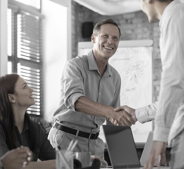 client and lending officer shaking hands