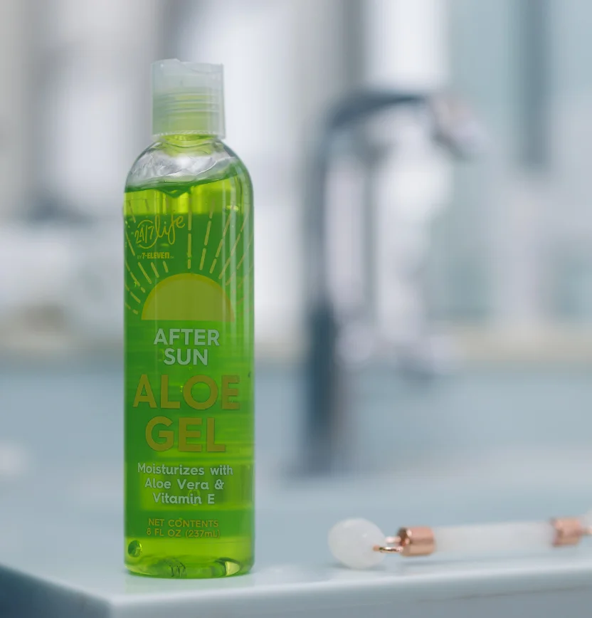 Photo of aloe vera gel in a bottle sitting on a bathroom counter to symbolize step 1 in the laser hair removal aftercare process