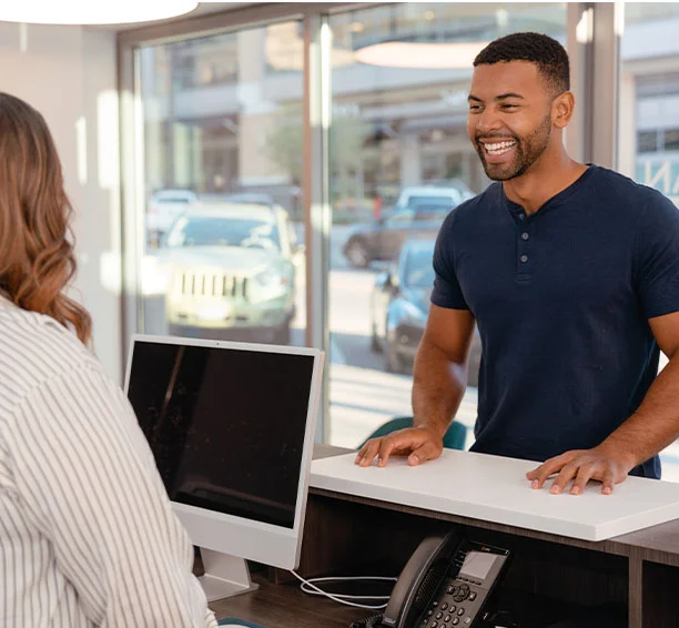 Men checking in at a Milan Laser clinic for his men's brazilian laser hair removal treatment