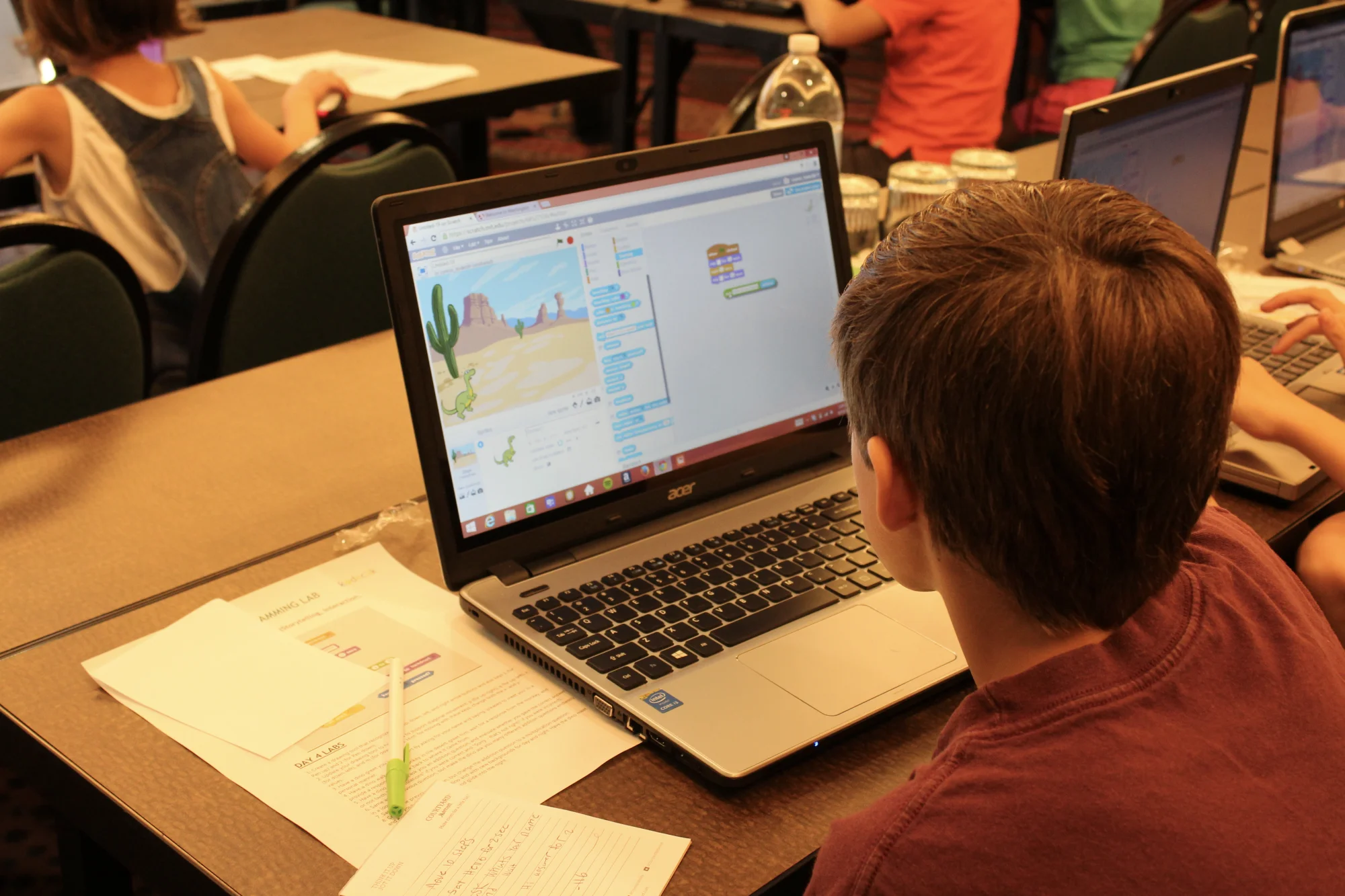 Kodeclik student working on Scratch programming