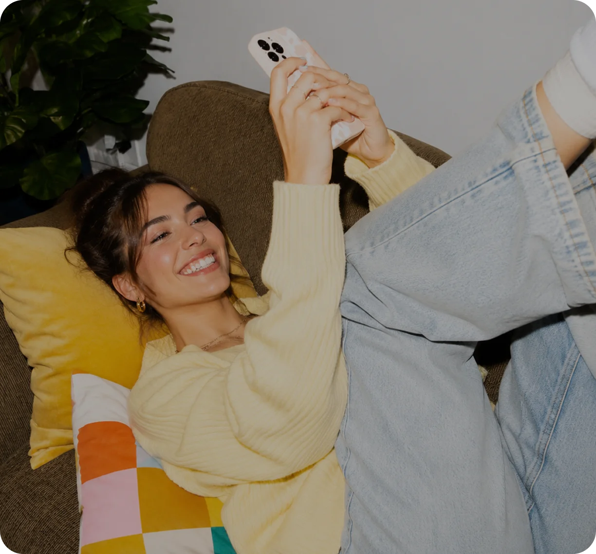 360 TikTok Solution: a relaxed seller browsing TikTok Shop on her phone