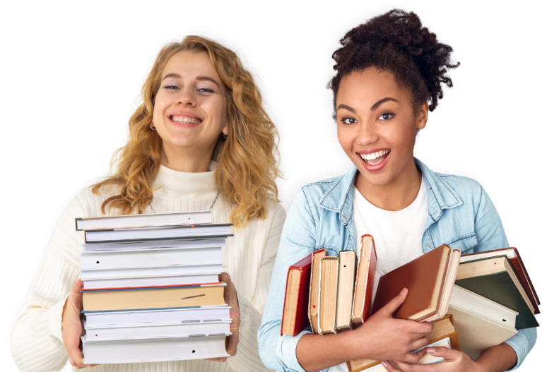 2 Women smiling, each holding a stack of books