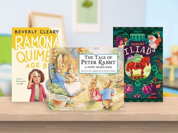 Books standing on shelf. Ramona Quimby, Age 8 by Beverly Cleary. The Tale Of Peter Rabbit by Beatrix Potter. Homer's Iliad (Kingfisher Epics) by Kingfisher