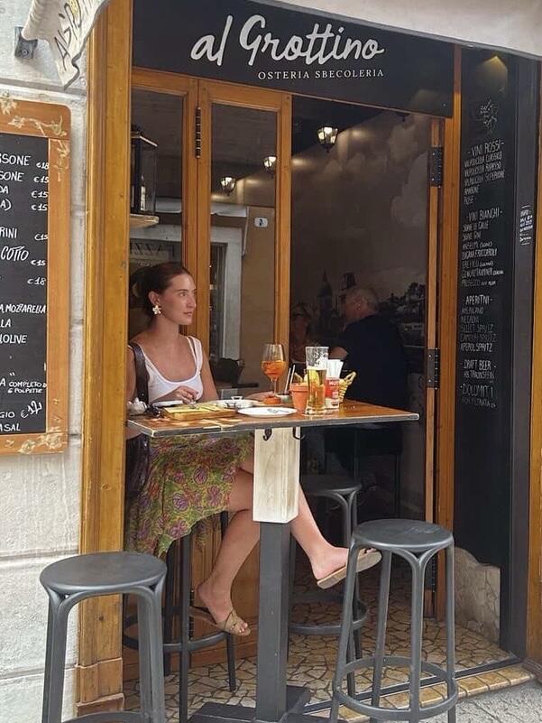 Beth, one of our Senior Villa Specialists at a trattoria in Italy