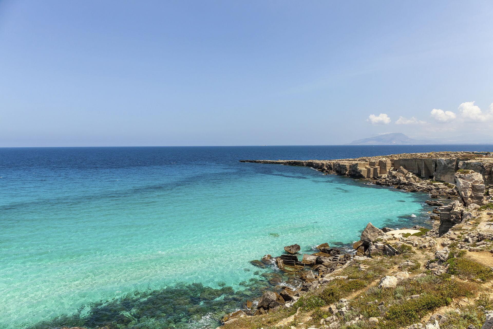 The irresistible waters of Cala Rossa on Favignana, the Egadi Islands.