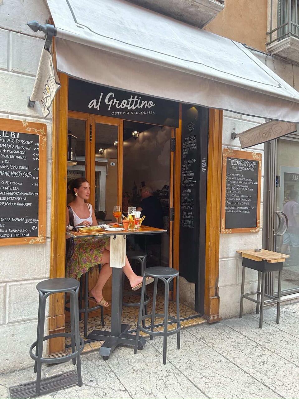 Beth, one of our Senior Villa Specialists at a trattoria in Italy