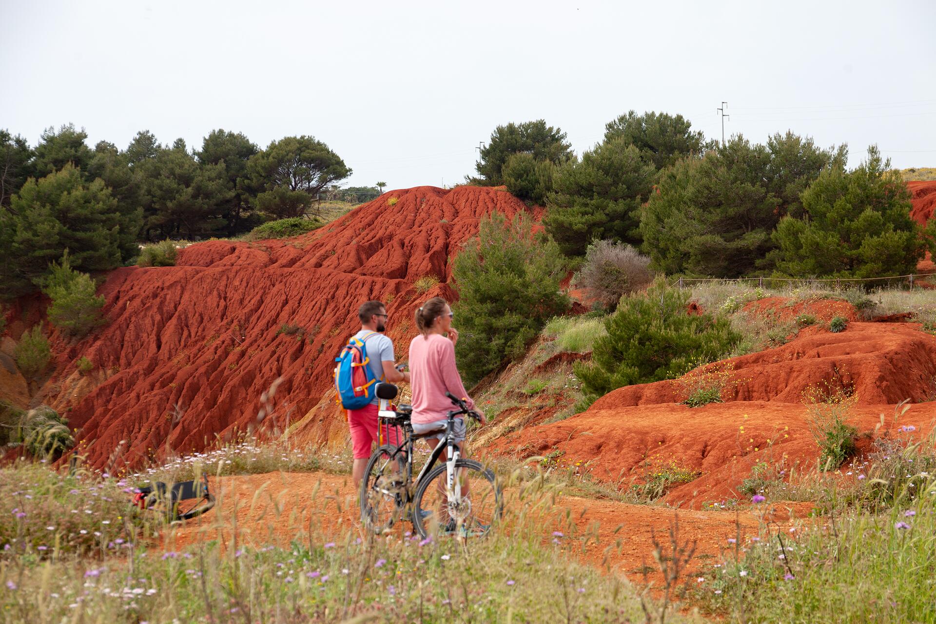 couple on a cycling holiday in puglia's cava bauxite