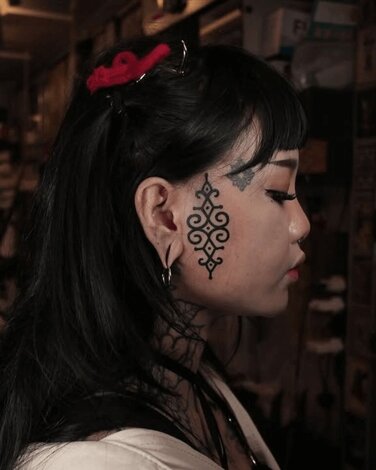 James Lau Tattoo Design on Face