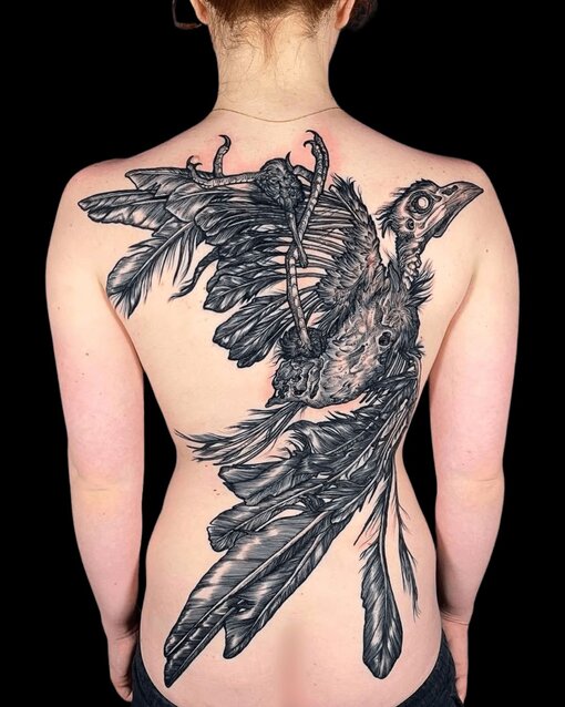 Landon Morgan Tattoo Design of Bird on back 