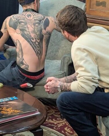 Evan Duswalt showing tattoo to Inked Abroad 