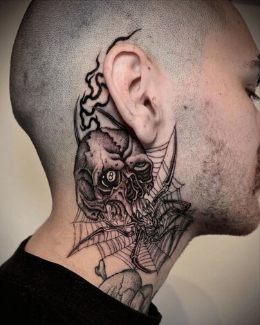 Carlos Truan Skull on Neck Tattoo