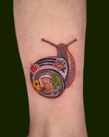 Pamela Carvalho Colorful Snail Tattoo
