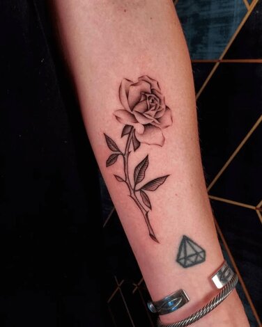 Jaz Paulino Fine Line Flower Tattoo Design