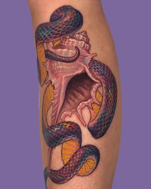 Pamela Carvalho Snake Tattoo on Arm