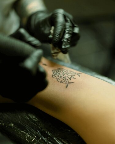 Tattoo getting done on a wrist