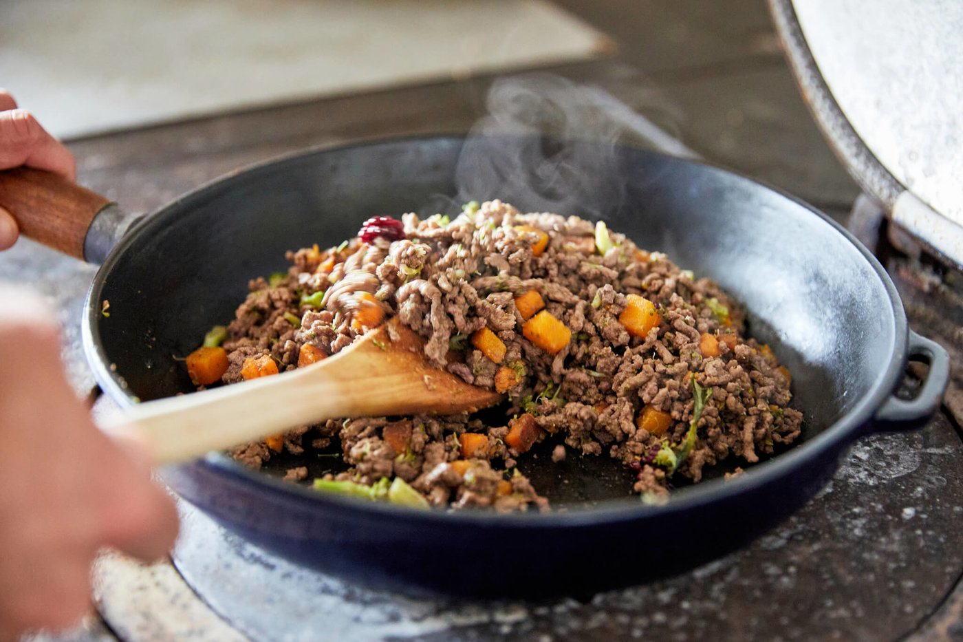 Different Dog meal being cooked in a pan