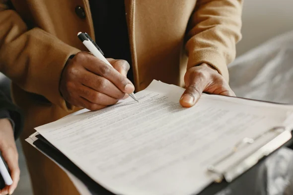 An attorney filling out divorce documents