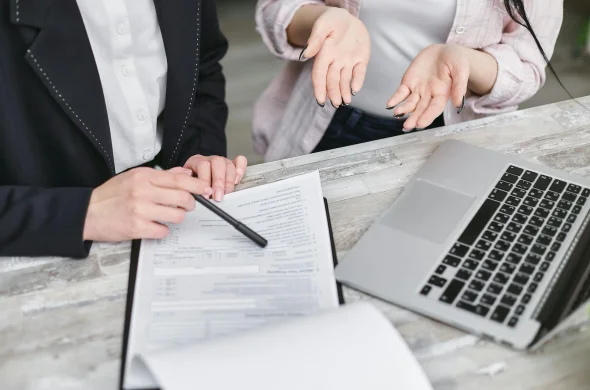 An attorney filling out divorce documents