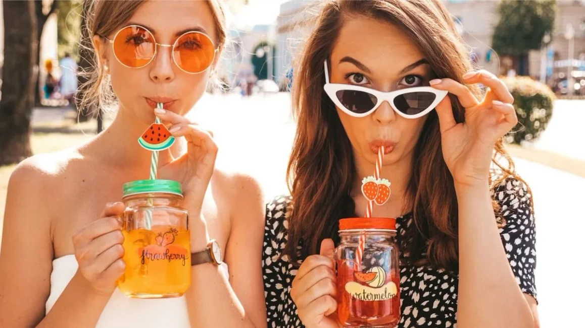 Women Drinking Lime Water Mixes