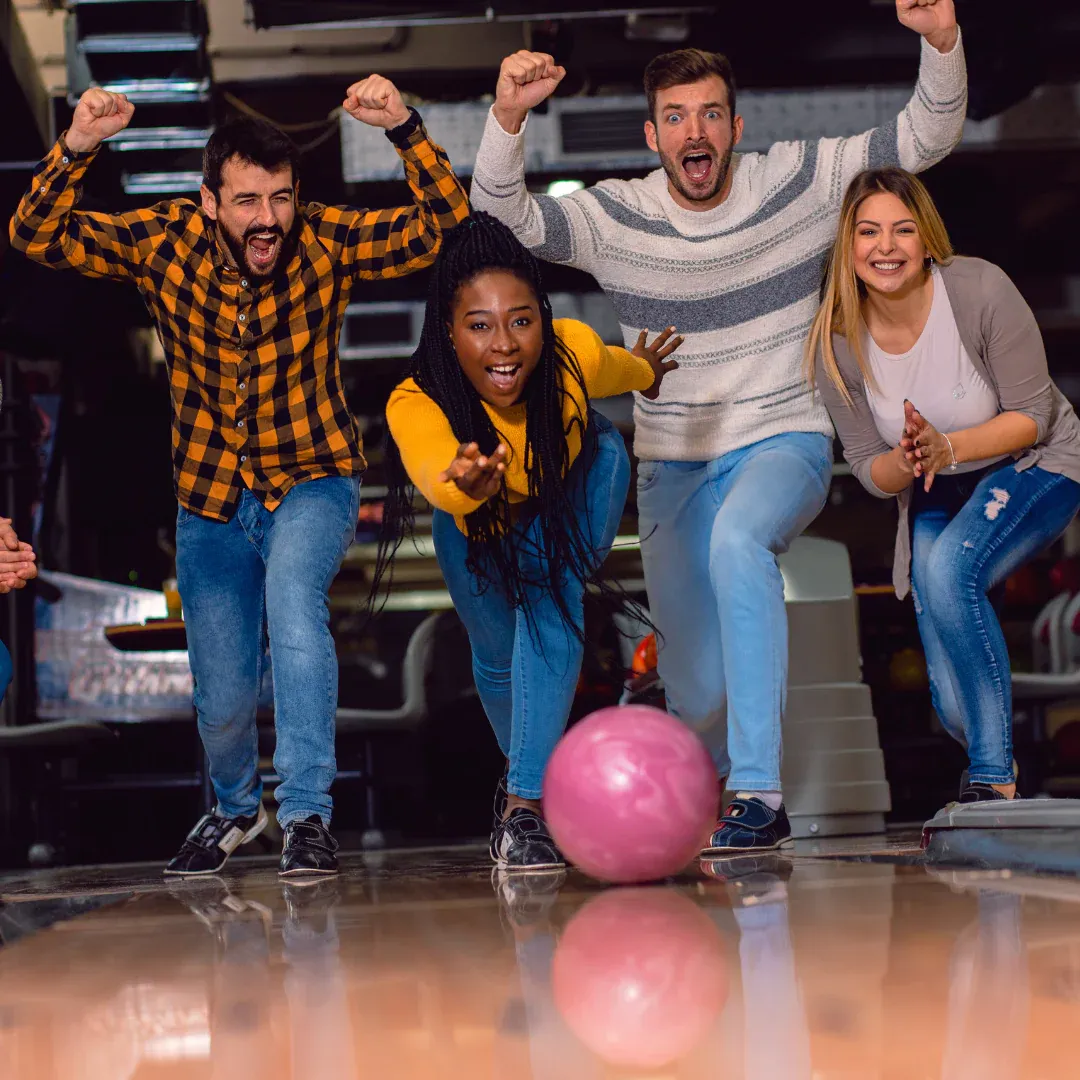 A group of friends bowling.