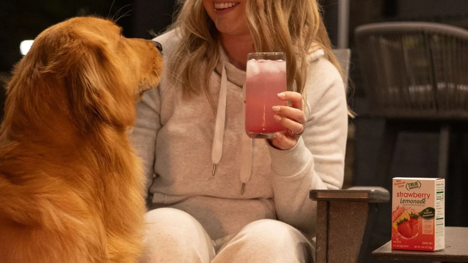 Woman With Dog Drinking True Lemon Strawberry Lemonade