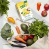 A bag of vegetables on a kitchen counter next to a box of True Lemon.