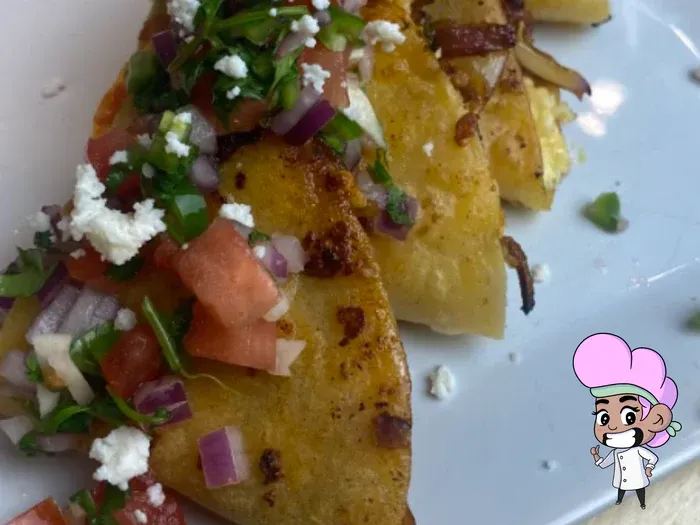 Squash blossom quesadillas with True Lime pico.