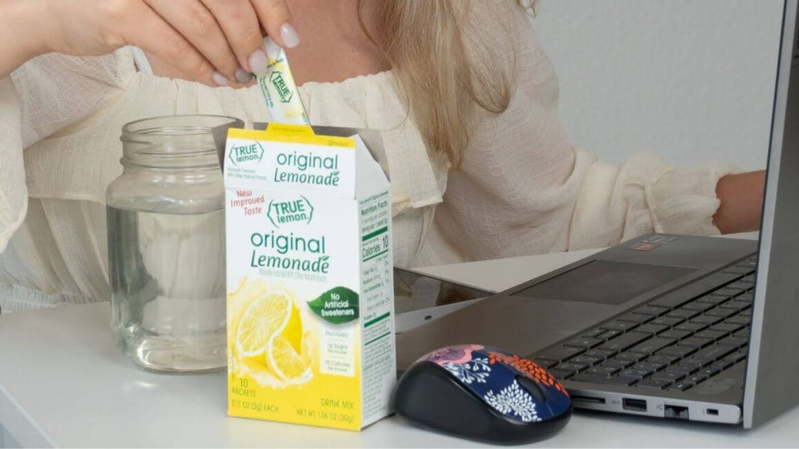 Hand Holding A Packet of True Lemon Original Lemonade