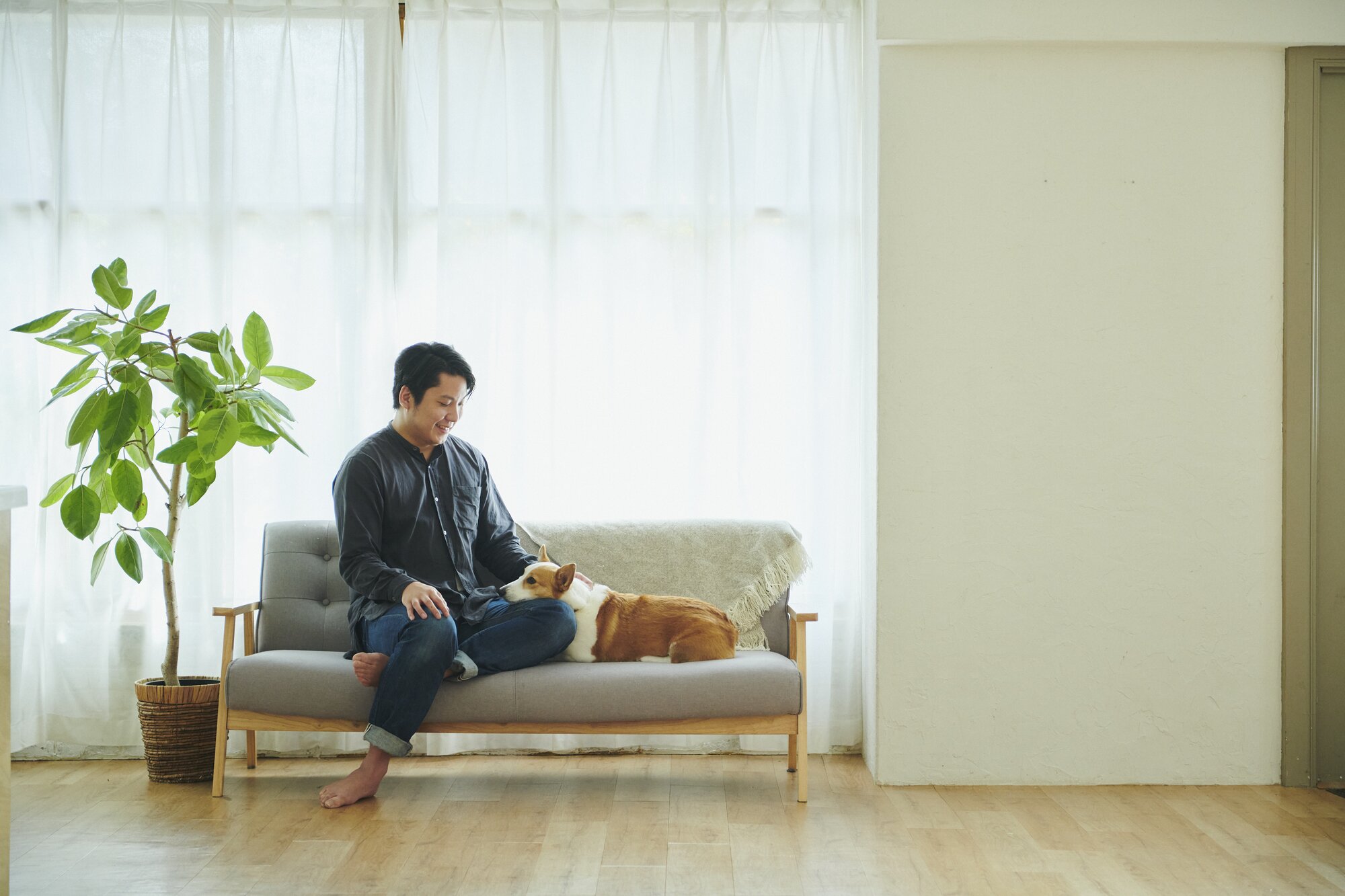 代表・大久保と愛犬コルク