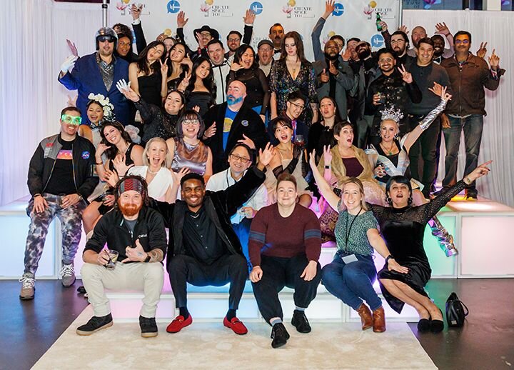 CallRail employees in a group photo holding up metal letters that spell out CallRail