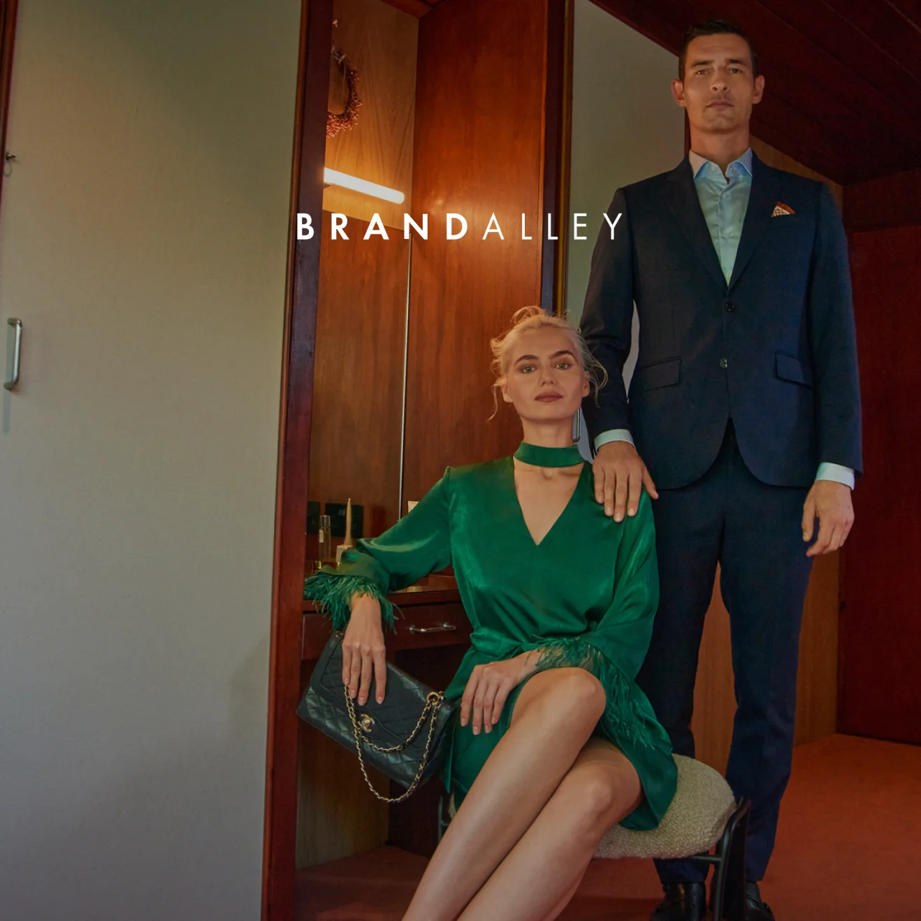 BrandAlley fashion campaign featuring two models in contemporary styling with elegant interior backdrop