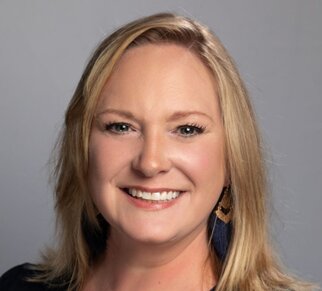 Inside a vehicle equipped for emergency response or storm observation, a 4Patriots portable power station solar generator supplies electricity to essential equipment during a lightning storm.