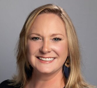 Inside a vehicle equipped for emergency response or storm observation, a 4Patriots portable power station solar generator supplies electricity to essential equipment during a lightning storm.