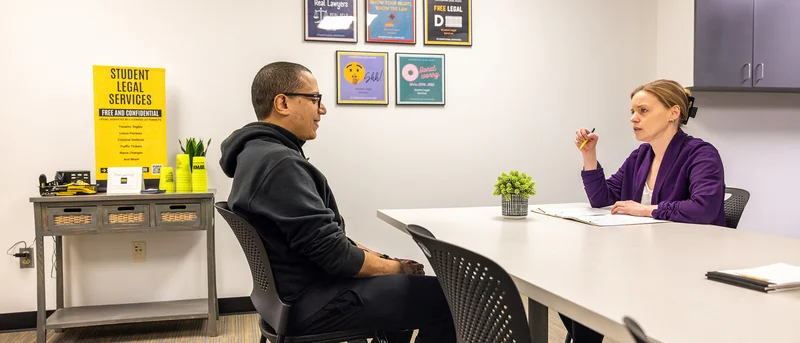 Student receiving help with a lease