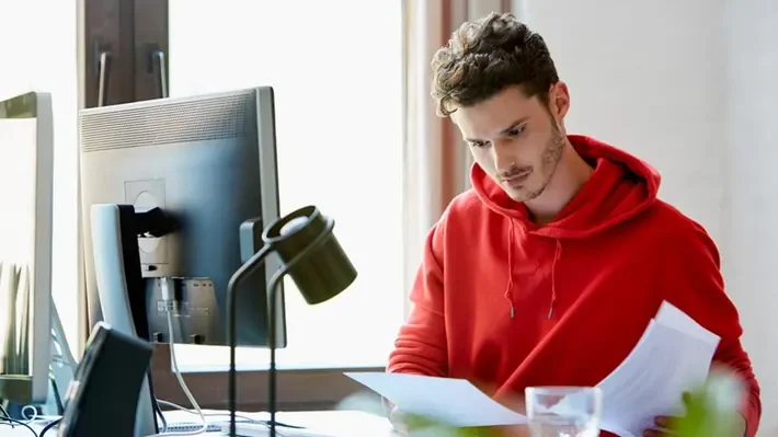 Person signing a lease document