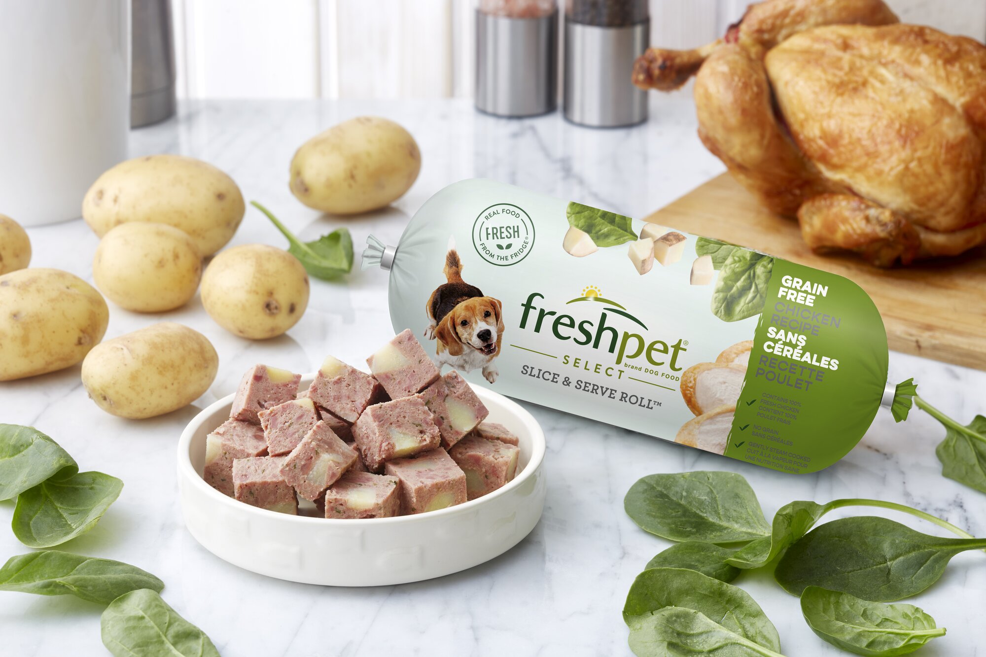 Freshpet grain free chicken recipe with potato & spinach on a kitchen table