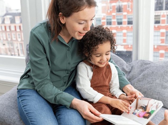 Mother and daughter reading a book